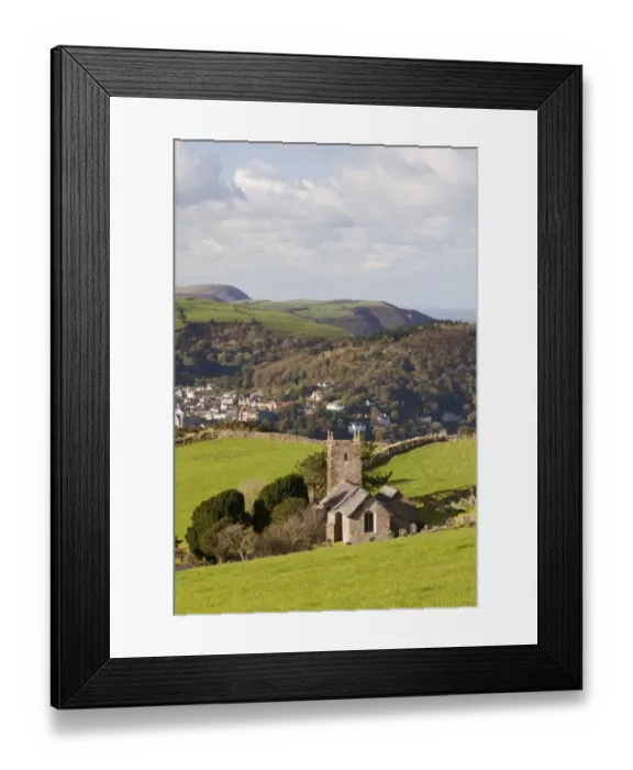Framed Print : View of church, village, woodland and coastline on sunny morning, Church of St Framed Print : View of church, village, woodland and coastline on sunny morning, Church of St