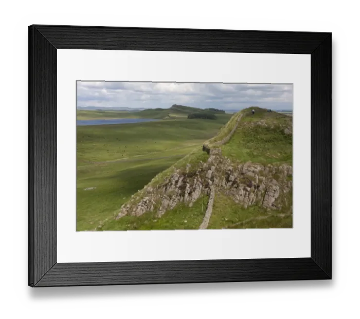 Framed Print : View of moorland and lake with remains of Roman fortifications, Hadrians Wall Framed Print : View of moorland and lake with remains of Roman fortifications, Hadrians Wall