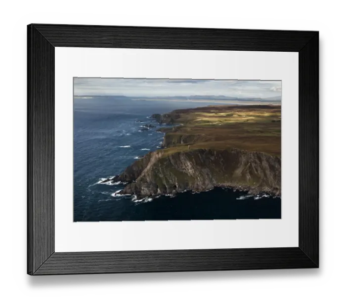 Framed Print : Aerial view of coastline with cliffs and commemorative monument, American Monument, Mull of Oa, Islay, Inner Hebrides