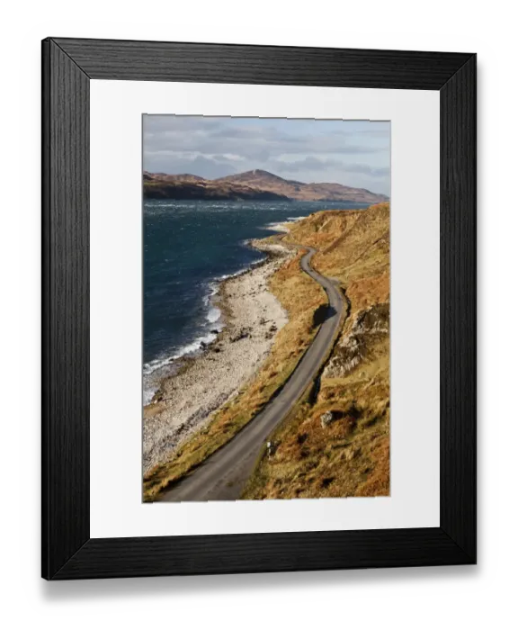 Framed Print : View of coastline with only road on island, leading in direction of Feolin Framed Print : View of coastline with only road on island, leading in direction of Feolin