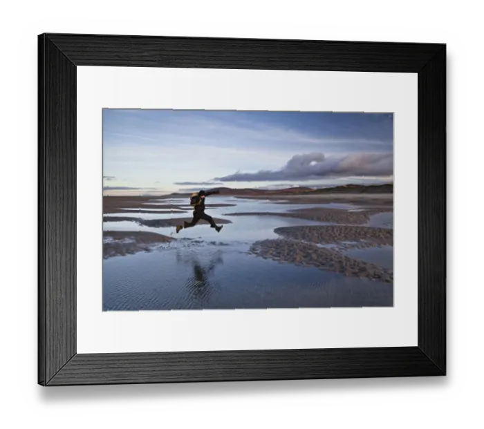 Framed Print : Man jumping over tidal sea puddles, Killinalan Point, Loch Gruinart, Isle of Islay, Inner Hebrides, Scotland Framed Print : Man jumping over tidal sea puddles, Killinalan Point, Loch Gruinart, Isle of Islay, Inner Hebrides, Scotland