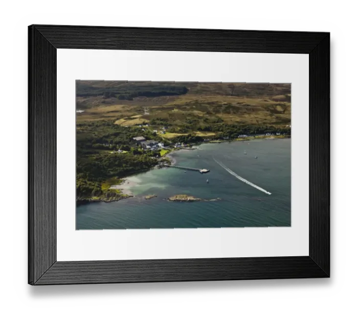 Framed Print : Aerial view of coastline with village and pier, Craighouse, Small Isles Bay, Isle of Jura, Inner Hebrides, Scotland Framed Print : Aerial view of coastline with village and pier, Craighouse, Small Isles Bay, Isle of Jura, Inner Hebrides, Scotland