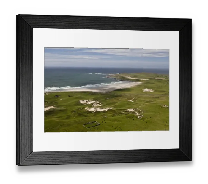 Framed Print : Aerial view of coastline with military cemetery, vegetated coastal dune habitat and beach, Kilchoman Military Cemetery