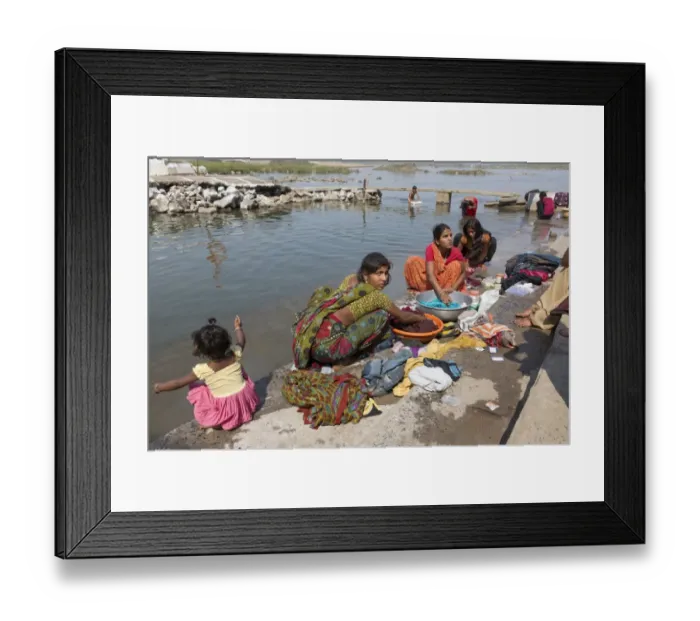 Framed Print : Women washing clothes in river, near Jabalpur, Madhya Pradesh, India, March Framed Print : Women washing clothes in river, near Jabalpur, Madhya Pradesh, India, March