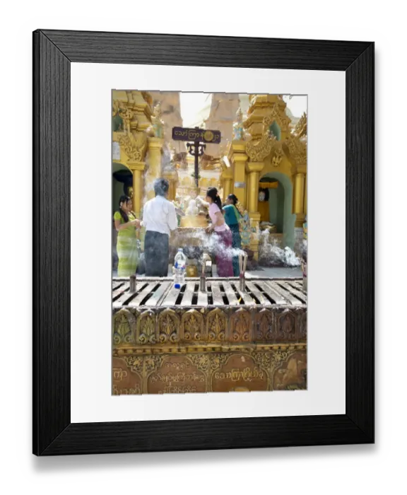 Framed Print : Smoke from incense burning with people at Buddhist alter, Shwedagon Pagoda, Yangon, Myanmar, March Framed Print : Smoke from incense burning with people at Buddhist alter, Shwedagon Pagoda, Yangon, Myanmar, March