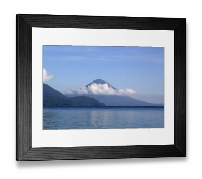 Framed Print : View of forest covered volcano cone on shores of coastal bay, Kimbe Bay, West New Britain Province, New Britain