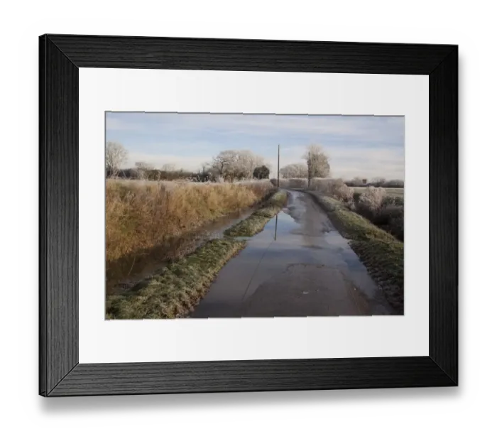 Framed Print : After heavy rain the field ditches have over flowed and flooded a Suffolk country lane Framed Print : After heavy rain the field ditches have over flowed and flooded a Suffolk country lane