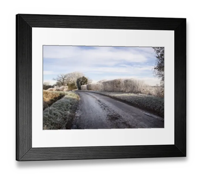 Framed Print : Black ice, sometimes called clear ice, refers to (a thin coating of glazed ice on a Road surface)