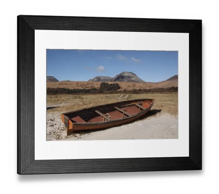 Framed Print : Beached rowing boat at Traigh na Mile beach with the Paps of Jura behind. - Isle of Jura Scotland