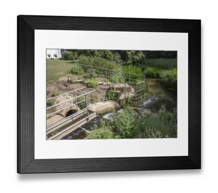 Framed Print : Treated water flows into the River Gipping at Stowmarket from industrial units Framed Print : Treated water flows into the River Gipping at Stowmarket from industrial units