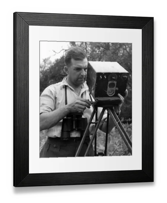 Framed Print : Eric Hosking setting up an automatic trip for use with High Speed Flash to Photograph birds in flight -1948