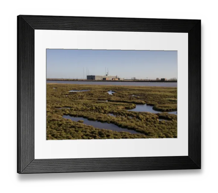 Framed Print : Looking over salt marsh on the edge of the River Alde, east toward the Radio station and masts on Orford Ness, Suffolk Framed Print : Looking over salt marsh on the edge of the River Alde, east toward the Radio station and masts on Orford Ness, Suffolk