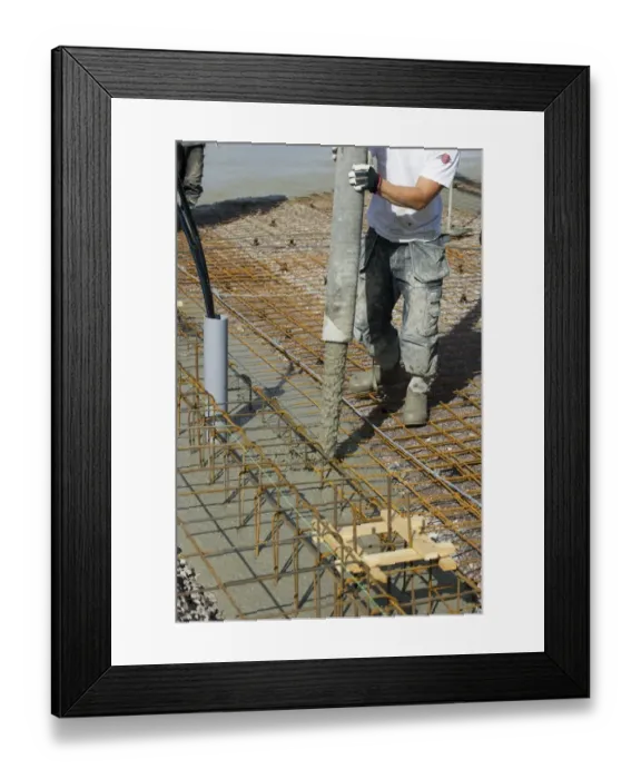 Framed Print : Construction work on farm building for loose housing, concrete being poured onto reinforcing bars for flooring, Sweden Framed Print : Construction work on farm building for loose housing, concrete being poured onto reinforcing bars for flooring, Sweden