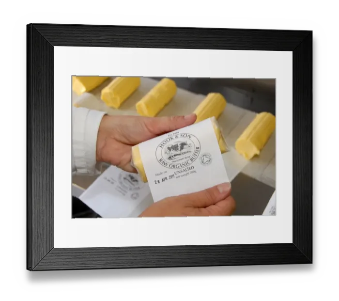 Framed Print : Worker labelling up organically made butter from unpasteurized milk, on organic dairy farm, Hook and Son Framed Print : Worker labelling up organically made butter from unpasteurized milk, on organic dairy farm, Hook and Son