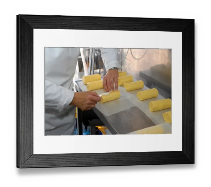 Framed Print : Worker wrapping up organically made butter from unpasteurized milk, on organic dairy farm, Hook and Son, Longleys Farm Framed Print : Worker wrapping up organically made butter from unpasteurized milk, on organic dairy farm, Hook and Son, Longleys Farm