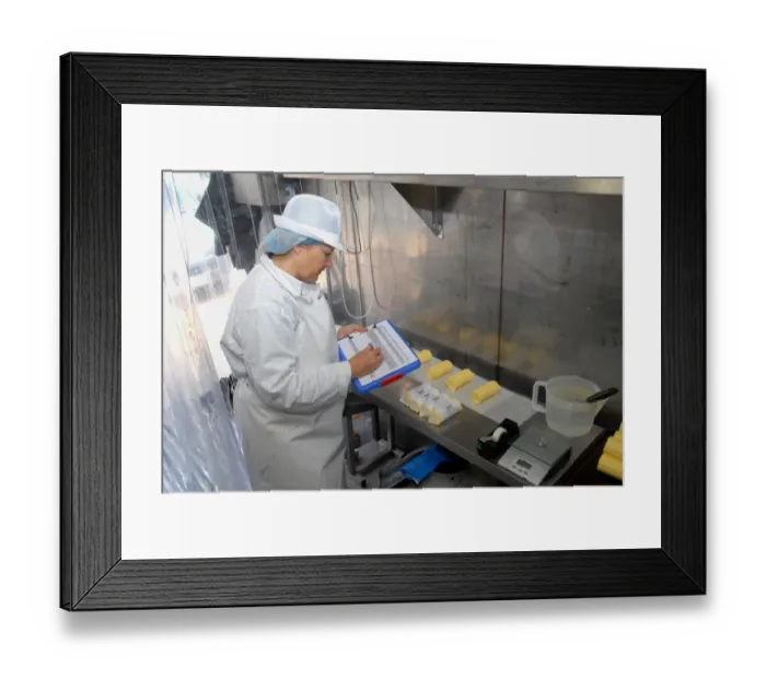 Framed Print : Worker recording batch of organically made butter from unpasteurized milk, on organic dairy farm, Hook and Son Framed Print : Worker recording batch of organically made butter from unpasteurized milk, on organic dairy farm, Hook and Son