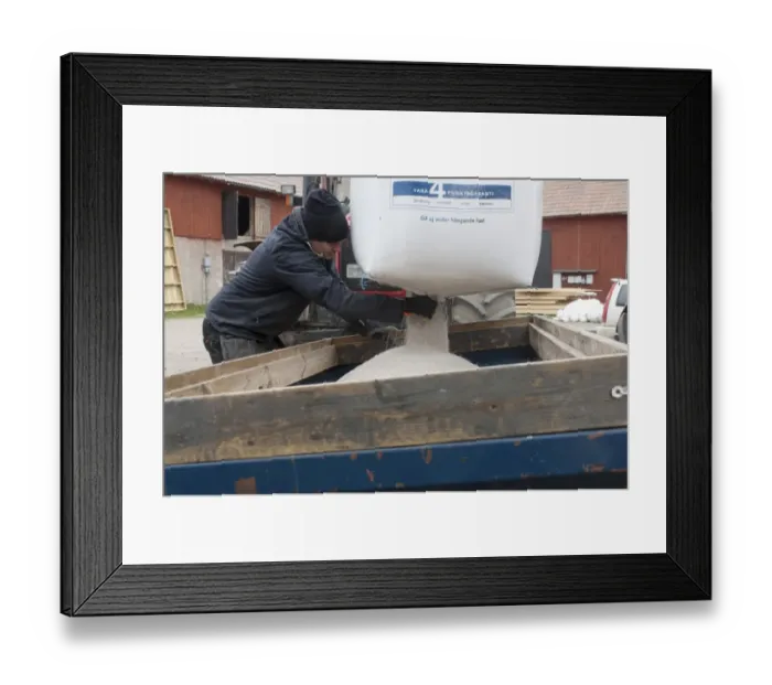 Framed Print : Farmer emptying bag of nitrogen granular fertilizer granules into fertilizer spreader, Sweden, may Framed Print : Farmer emptying bag of nitrogen granular fertilizer granules into fertilizer spreader, Sweden, may