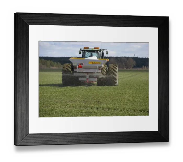 Framed Print : John Deere 8530 tractor with Bredal TX3500 spreader, spreading granular fertilizer on arable field, Tierp Framed Print : John Deere 8530 tractor with Bredal TX3500 spreader, spreading granular fertilizer on arable field, Tierp