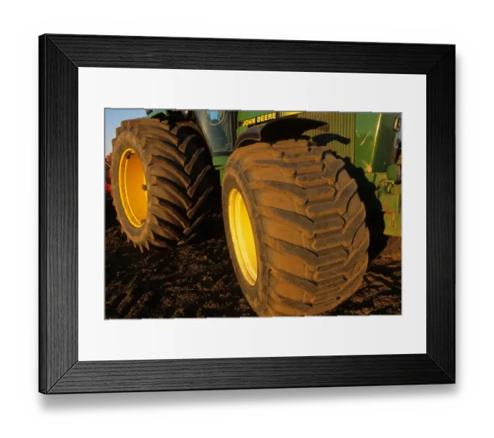 Framed Print : Farm machinery, big wheels on John Deere tractor, Sweden Framed Print : Farm machinery, big wheels on John Deere tractor, Sweden