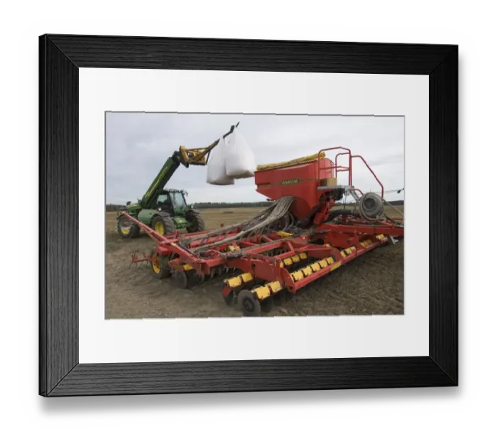 Framed Print : John Deere 3400 telehandler with bags of wheat seed, loading Vaderstad seed drill, Sweden, autumn Framed Print : John Deere 3400 telehandler with bags of wheat seed, loading Vaderstad seed drill, Sweden, autumn