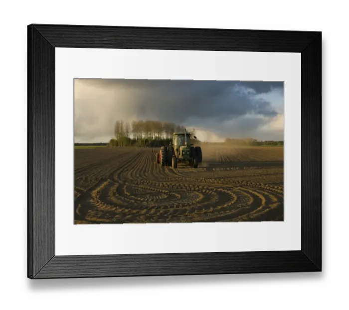 Framed Print : John Deere 2140 tractor pulling seed drill, drilling arable field, with approaching storm clouds, Sweden Framed Print : John Deere 2140 tractor pulling seed drill, drilling arable field, with approaching storm clouds, Sweden