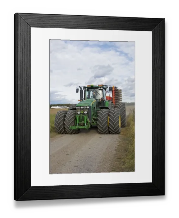 Framed Print : John Deere 8530 tractor, with dual wheels, driving along rural track, Sweden Framed Print : John Deere 8530 tractor, with dual wheels, driving along rural track, Sweden
