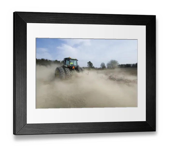 Framed Print : John Deere tractor pulling Vaderstad cultivator, cultivating arable seedbed, in dusty ploughed field, Sweden Framed Print : John Deere tractor pulling Vaderstad cultivator, cultivating arable seedbed, in dusty ploughed field, Sweden