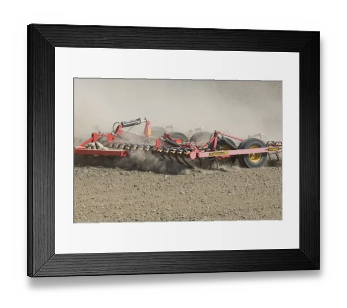 Framed Print : Close-up of Vaderstad cultivator, cultivating arable seedbed, in dusty ploughed field, Sweden