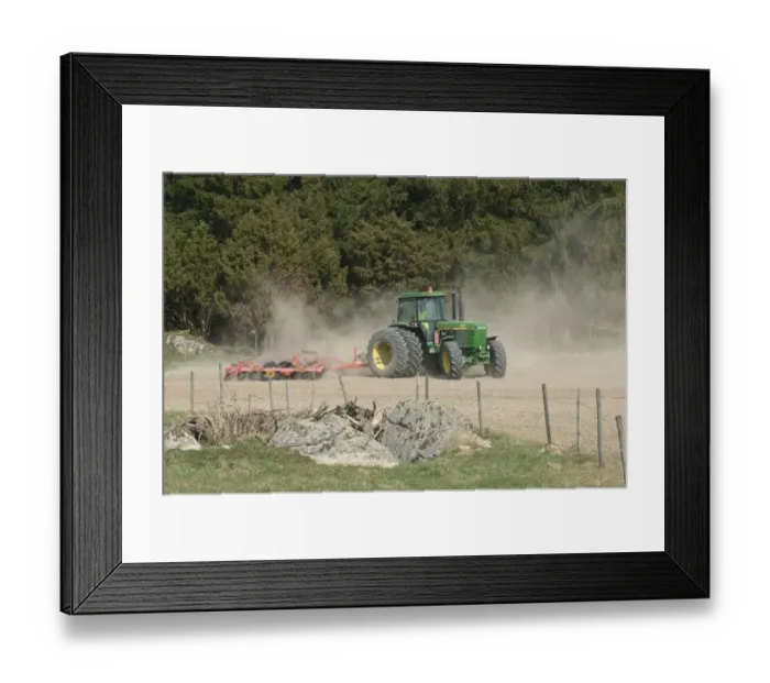 Framed Print : John Deere 4455 tractor pulling Vaderstad cultivator, cultivating arable seedbed, in dusty ploughed field, Sweden