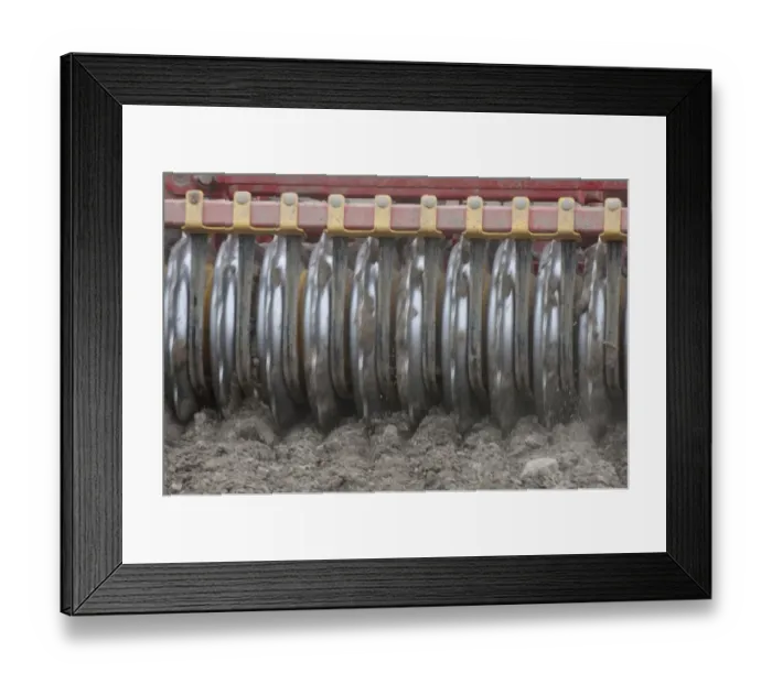 Framed Print : Close-up of disc harrows, cultivating arable field, Sweden, may Framed Print : Close-up of disc harrows, cultivating arable field, Sweden, may