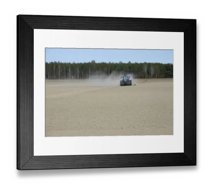 Framed Print : New Holland TM150 tractor, drilling in field with wind blown dust, Sweden, may Framed Print : New Holland TM150 tractor, drilling in field with wind blown dust, Sweden, may
