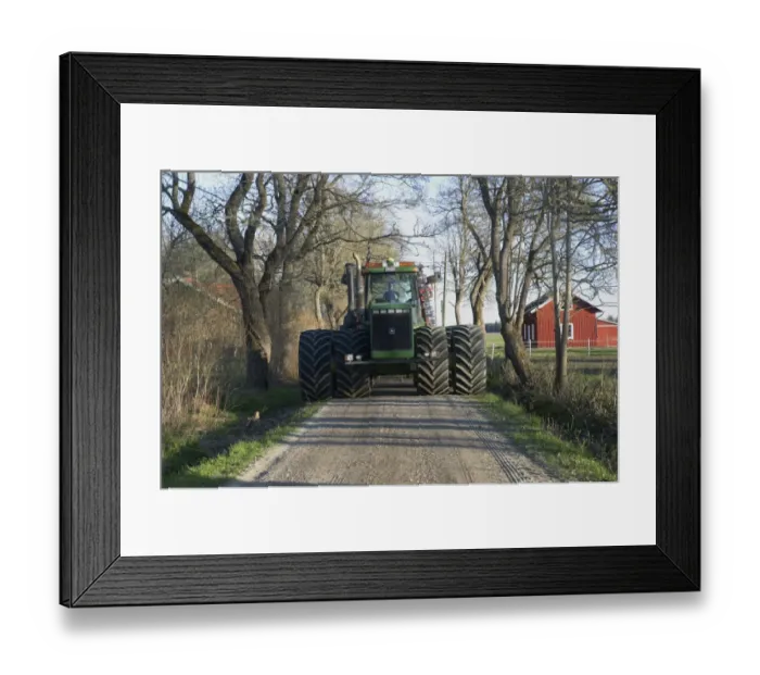 Framed Print : John Deere 9400 tractor, with dual wheels, driving along small road on way to fields, Uppland, Sweden, may Framed Print : John Deere 9400 tractor, with dual wheels, driving along small road on way to fields, Uppland, Sweden, may