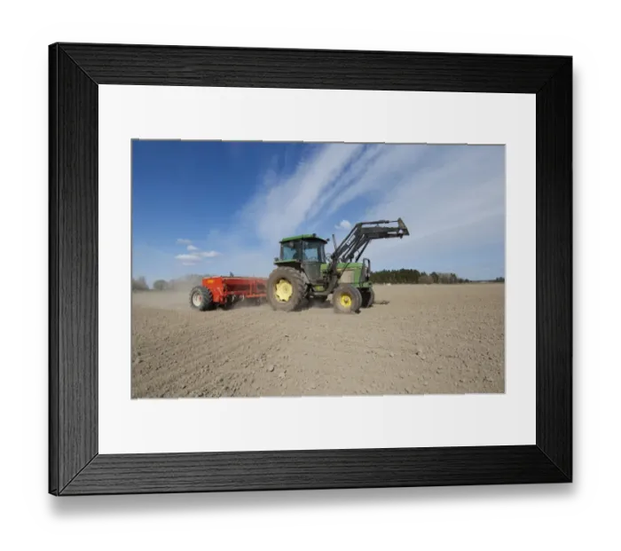 Framed Print : John Deere 2140 tractor with Tume seed drill, sowing arable crop in dusty field, Sweden, may Framed Print : John Deere 2140 tractor with Tume seed drill, sowing arable crop in dusty field, Sweden, may