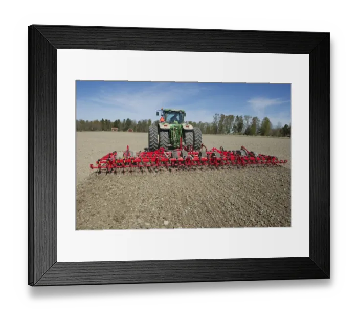 Framed Print : John Deere 7720 tractor with Vaderstad NZ-Aggressive-800 harrows, harrowing arable field, Sweden, may Framed Print : John Deere 7720 tractor with Vaderstad NZ-Aggressive-800 harrows, harrowing arable field, Sweden, may