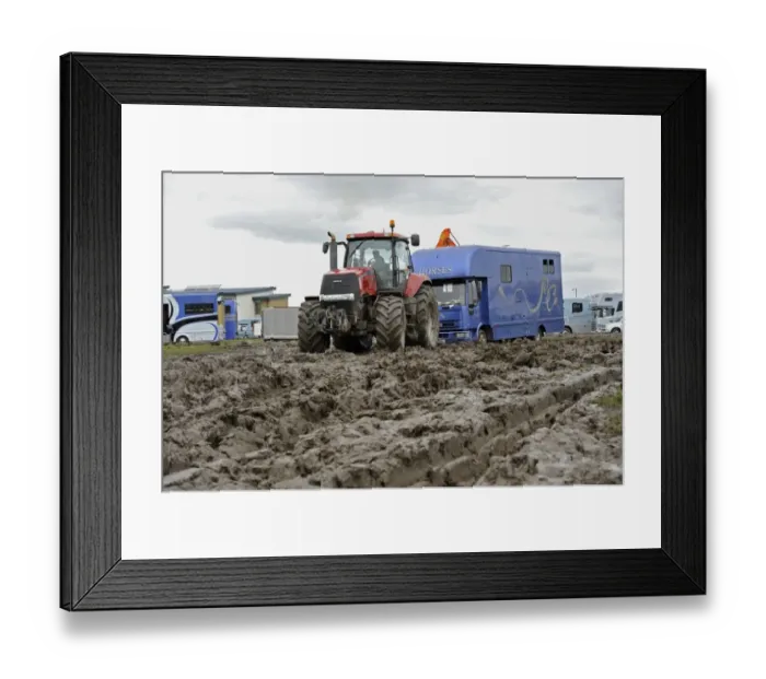 Framed Print : Case tractor pulling horse lorry out of muddy carpark at agricultural show, which was cancelled due to bad weather Framed Print : Case tractor pulling horse lorry out of muddy carpark at agricultural show, which was cancelled due to bad weather