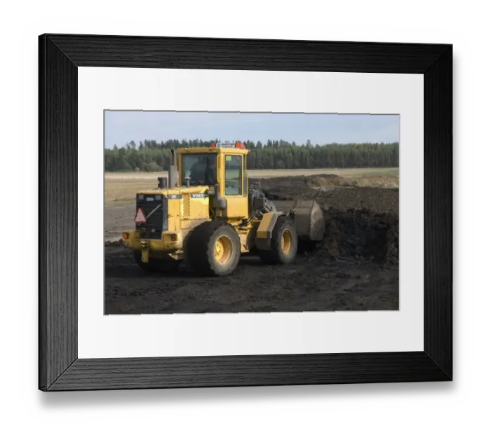 Framed Print : Volvo L50 D wheel loader, loading muck into bucket, to load muck spreader, Sweden, autumn Framed Print : Volvo L50 D wheel loader, loading muck into bucket, to load muck spreader, Sweden, autumn