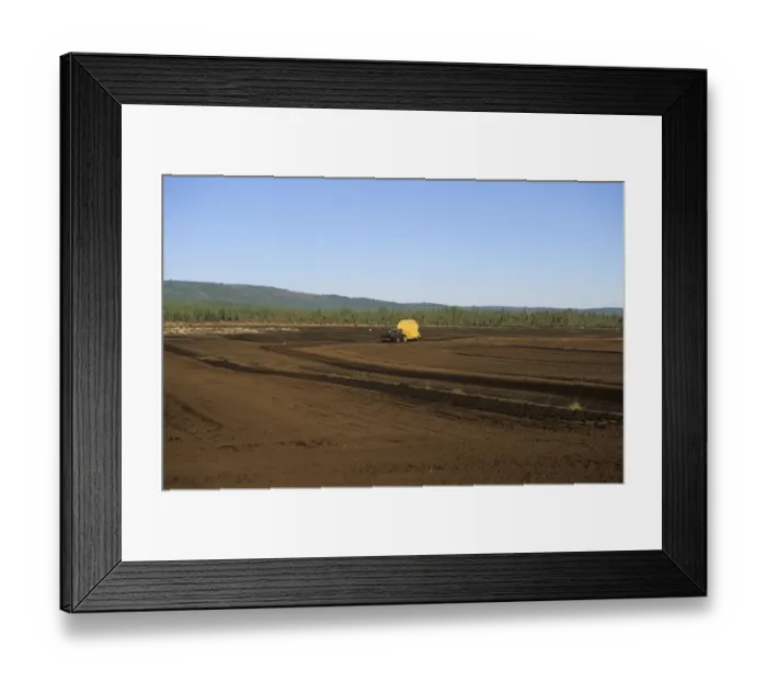 Framed Print : Peat extraction, tractor pulling mechanical peat extractor, working on peat bog, Sweden Framed Print : Peat extraction, tractor pulling mechanical peat extractor, working on peat bog, Sweden