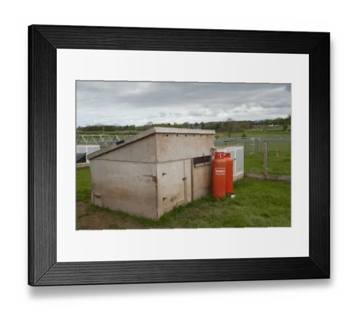 Framed Print : Gamebird farming, pheasant rearing shed with propane gas cylinders, used to provide heat to young chicks, England, May
