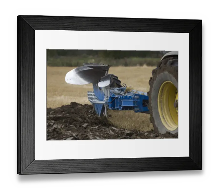 Framed Print : Close-up of eight furrow reversible plough, ploughing stubble field, Sweden, autumn Framed Print : Close-up of eight furrow reversible plough, ploughing stubble field, Sweden, autumn