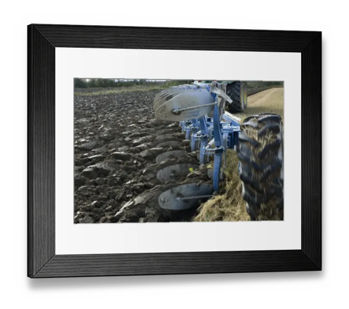 Framed Print : Close-up of eight furrow reversible plough pulled by tractor, ploughing stubble field, Sweden, autumn Framed Print : Close-up of eight furrow reversible plough pulled by tractor, ploughing stubble field, Sweden, autumn