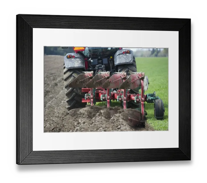 Framed Print : Valtra tractor ploughing field with four furrow reversible plough, Sweden, may Framed Print : Valtra tractor ploughing field with four furrow reversible plough, Sweden, may