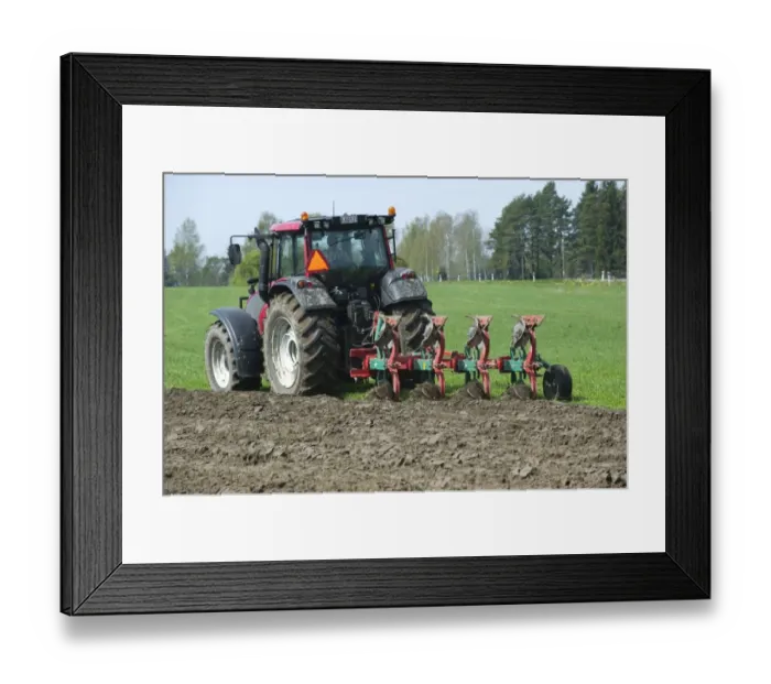 Framed Print : Valtra tractor ploughing field with four furrow reversible plough, Sweden, may Framed Print : Valtra tractor ploughing field with four furrow reversible plough, Sweden, may