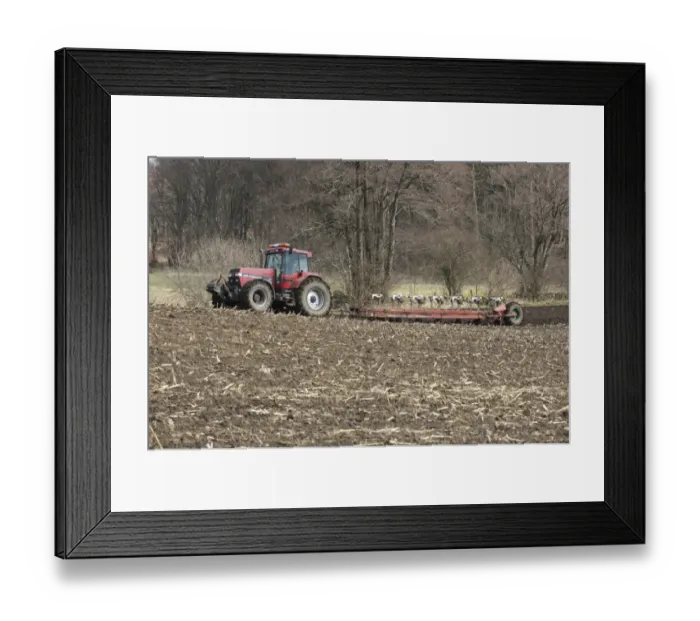 Framed Print : Case Internationel 7140 tractor pulling Kverneland seven furrow plough, ploughing field, Skane, Sweden, spring