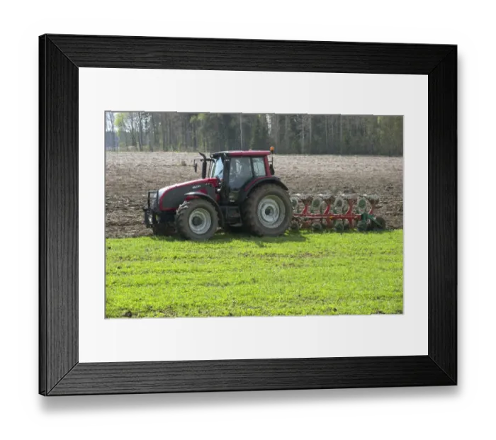 Framed Print : Valtra tractor ploughing field with four furrow reversible plough, Sweden, may Framed Print : Valtra tractor ploughing field with four furrow reversible plough, Sweden, may