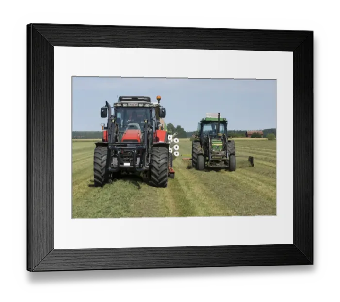 Framed Print : Tractors with rotary rake and baler, turning cut grass and baling silage crop, Sweden