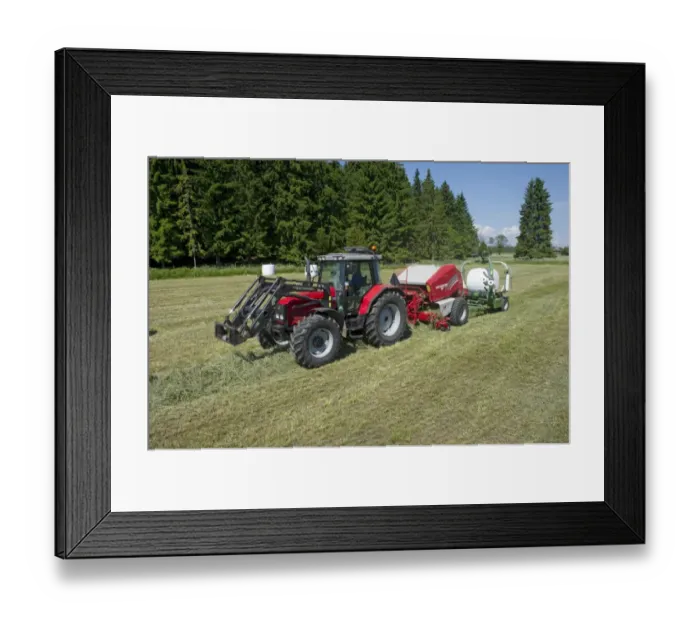Framed Print : Silage crop, Massey Ferguson tractor with round baler and bale-wrapper, baling and plastic wrapping bales in field