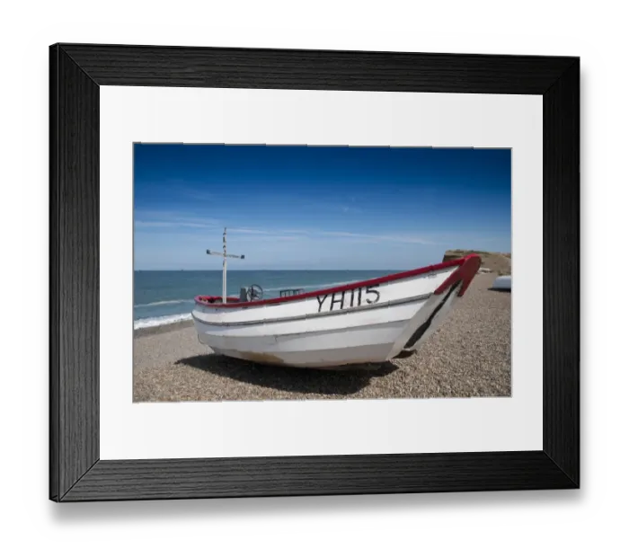 Framed Print : Small fishing boat on shingle beach, Weybourne, Norfolk, England, August Framed Print : Small fishing boat on shingle beach, Weybourne, Norfolk, England, August