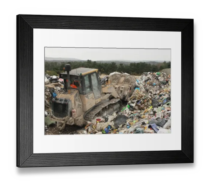 Framed Print : Bulldozer moving rubbish on landfill tip, Dorset, England, February Framed Print : Bulldozer moving rubbish on landfill tip, Dorset, England, February