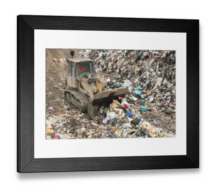 Framed Print : Bulldozer moving rubbish on landfill tip, Dorset, England, February Framed Print : Bulldozer moving rubbish on landfill tip, Dorset, England, February