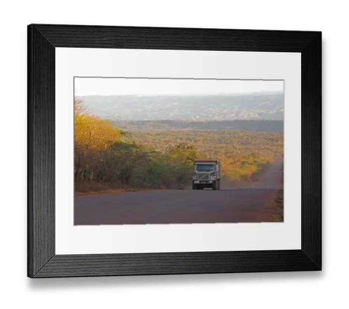 Framed Print : Trucking Bauxite aluminium ore along Alcoa Road from opencast mines to port of Cabo Rojo, Pedernales Province Framed Print : Trucking Bauxite aluminium ore along Alcoa Road from opencast mines to port of Cabo Rojo, Pedernales Province